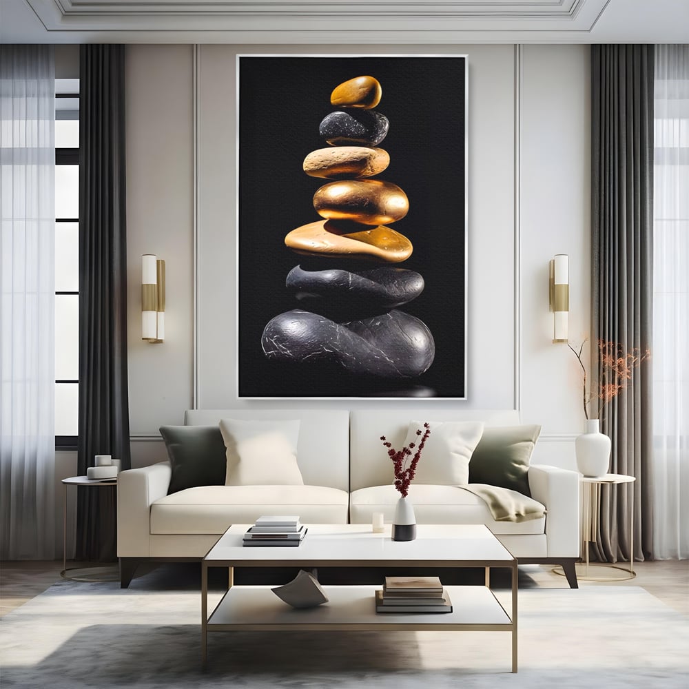 Tablou canvas cu turn vertical din pietre suprapuse, in rama de aluminiu argintiu, pe perete intr-un living